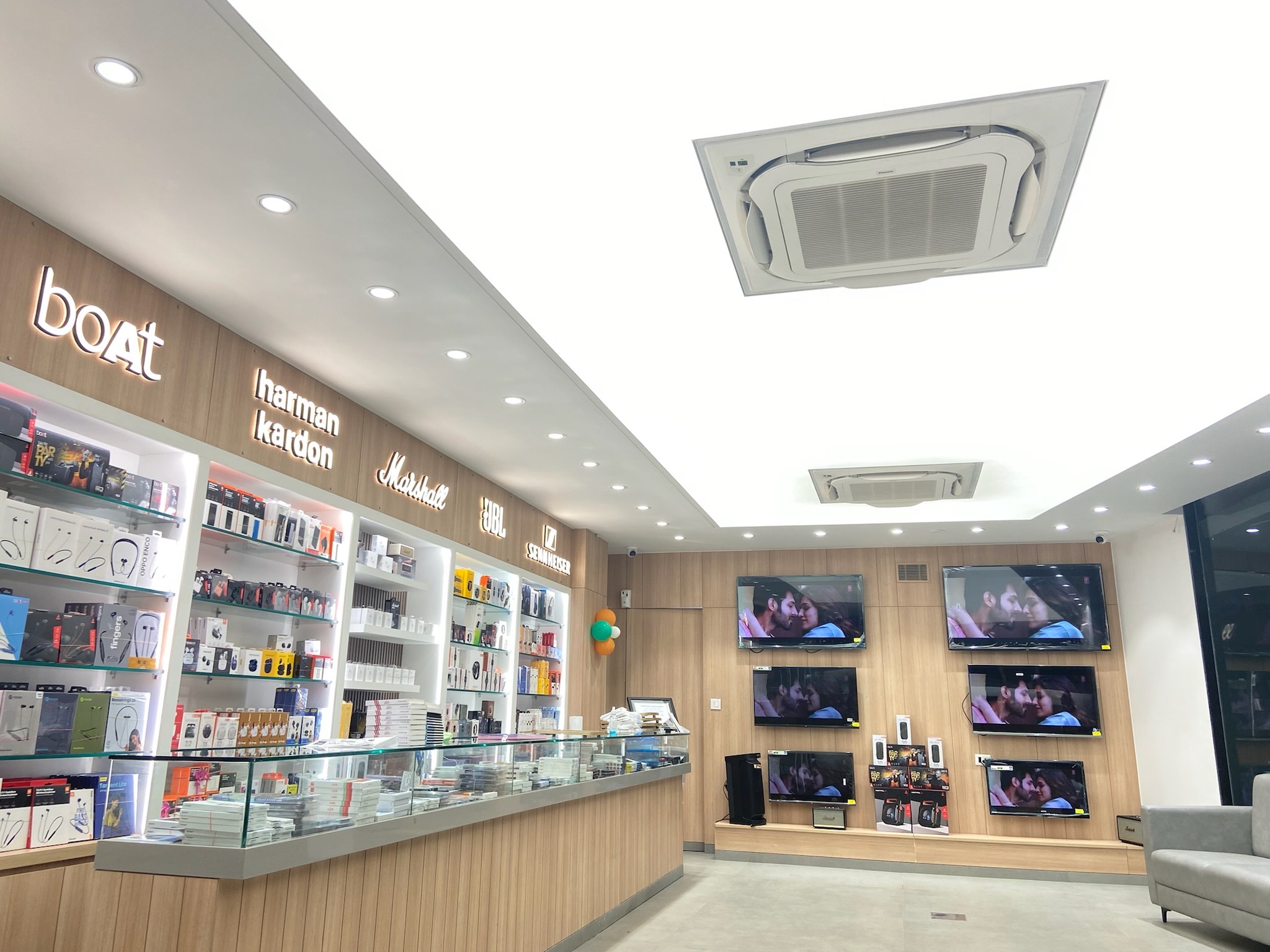 Modern mobile showroom illuminated with Osram LCX LED translucent ceiling