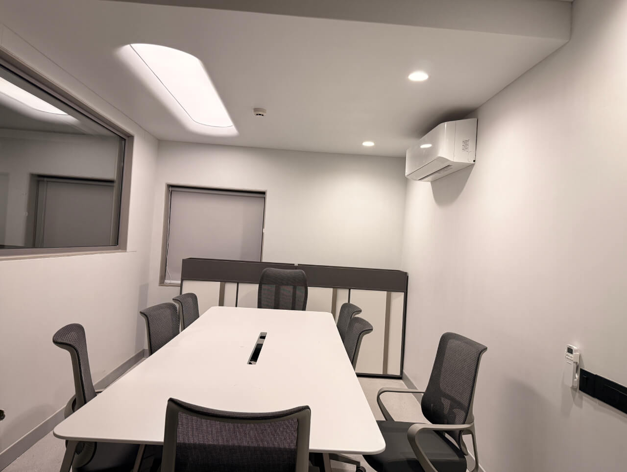 Elegant director cabin in Gujarat with a circular stretch fabric ceiling and integrated Osram LED backlighting for a seamless glow.